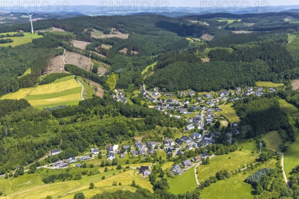 Aerial view, forest area with view of Rehringhausen, Olpe, Sauerland, North Rhine-Westphalia, Germany, DE, Europe, property tax, hilly landscape, real estate, aerial view, aerial photography, aerial photography, townscape, city area, overview, bird's-eye view, forest, forest area, residential area, living and living, residential area, residential buildings, quality of life, housing estate, birds-eyes view, overview