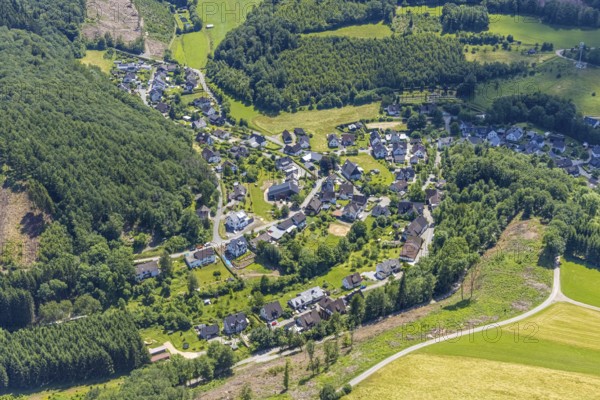 Aerial view, forest area with local view Rehringhausen, Olpe, Sauerland, North Rhine-Westphalia, Germany, DE, Europe, property tax, real estate, aerial view, aerial photography, aerial photography, local view, townscape, urban area, overview, bird's-eye view, forest, forest area, residential area, living and living, residential area, residential buildings, residential quality, housing estate, birds-eyes view, overview