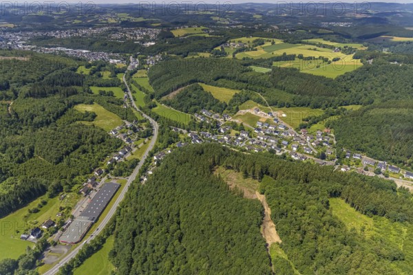 Aerial view, industrial area Stachelauer Hütte, Siegener Straße and local view Stachelau, Olpe, Sauerland, North Rhine-Westphalia, Germany, federal road B54, DE, Europe, property tax, hilly landscape, real estate, aerial view, aerial photography, aerial photography, local view, townscape, urban area, overview, bird's eye view, forest area, meadows and fields, residential area, living and life, residential area, residential buildings, residential quality, housing estate, birds-eyes view, overview
