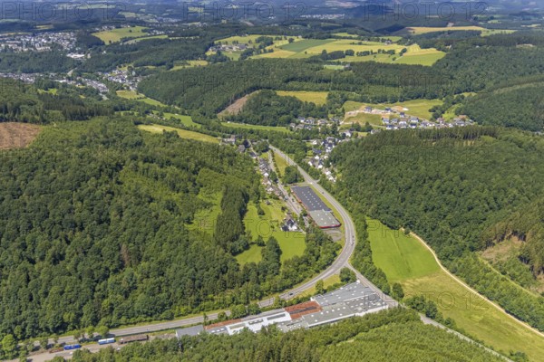 Aerial view, industrial area Stachelauer Hütte, Siegener Straße and local view Stachelau, Olpe, Sauerland, North Rhine-Westphalia, Germany, federal road B54, DE, Europe, property tax, hilly landscape, real estate, aerial view, aerial photography, aerial photography, local view, townscape, urban area, overview, bird's eye view, forest area, meadows and fields, residential area, living and life, residential area, residential buildings, residential quality, housing estate, birds-eyes view, overview