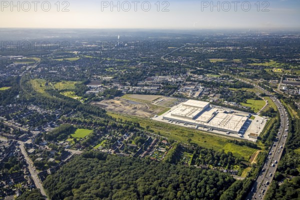 Aerial view, Edeka central warehouse Oberhausen with fallow land and Sterkrade colliery in the district of Schwarze Heide in Oberhausen, Ruhr area, North Rhine-Westphalia, Germany, construction area, building site, building plots, DE, Europe, commercial enterprises, commercial area, commercial park, commercial location, commercial use, freight traffic, industrial area, industrial building, industrial site, logistics, logistics service, logistics service provider, logistics provider, logistics centre, aerial view, aerial photography, aerial photography, Oberhausen, transport service, overview, bird's eye view, colliery, birds-eyes view, overview