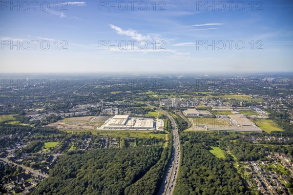 Aerial view, Edeka central warehouse Oberhausen as well as SEGRO Logistics Park Oberhausen and Lekkerland logistics centre Oberhausen and chemical plant Celanese Europe BV in the Waldteich industrial park in the Schwarze Heide district of Oberhausen, Ruhr area, North Rhine-Westphalia, Germany, A3 motorway, construction area, construction site, building plots, DE, Europe, commercial enterprises, commercial space, commercial area, commercial park, commercial location, commercial use, freight traffic, industrial area, industrial building, industrial location, logistics, logistics service, logistics service provider, logistics provider, logistics centre, aerial view, aerial photography, aerial photography, Oberhausen, SEGRO Parks, transport service, overview, bird's-eye view, overview