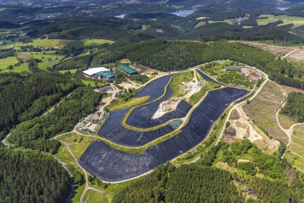 Aerial view, Landfill Olper Entsorgungszentrum GmbH, Oberveischede Unterneger, Oberveischede, Olpe, Sauerland, North Rhine-Westphalia, Germany, waste, bark beetle plague, DE, landfill* Germany, drought, Europe, spruce dieback, aerial photograph, aerial view, dump, hilly landscape, compost, composting plant Olpe, storage, aerial view, aerial photography, aerial photograph, aerial photography, waste, Neuenwald, recycling, recycling centre, collection point, drought, overview, sealing, recycling, bird's-eye view, forest damage, forest damage, lack of water, birds-eyes view, overview
