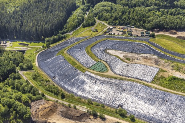 Aerial view, Landfill Olper Entsorgungszentrum GmbH, Oberveischede Unterneger, Oberveischede, Olpe, Sauerland, North Rhine-Westphalia, Germany, waste, bark beetle plague, DE, landfill* Germany, drought, Europe, spruce dieback, aerial photograph, aerial view, dump, hilly landscape, compost, composting plant Olpe, storage, aerial view, aerial photography, aerial photograph, aerial photography, waste, Neuenwald, recycling, recycling centre, collection point, drought, overview, sealing, recycling, bird's-eye view, forest damage, forest damage, lack of water, birds-eyes view, overview