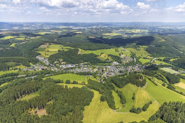 Aerial view, forest area and local view Oberveischede, sports field Am Kapellchen, Olpe, Sauerland, North Rhine-Westphalia, Germany, DE, Europe, hilly landscape, aerial view, aerial photography, aerial photography, local view, sports field, townscape, urban area, overview, bird's-eye view, birds-eyes view, overview