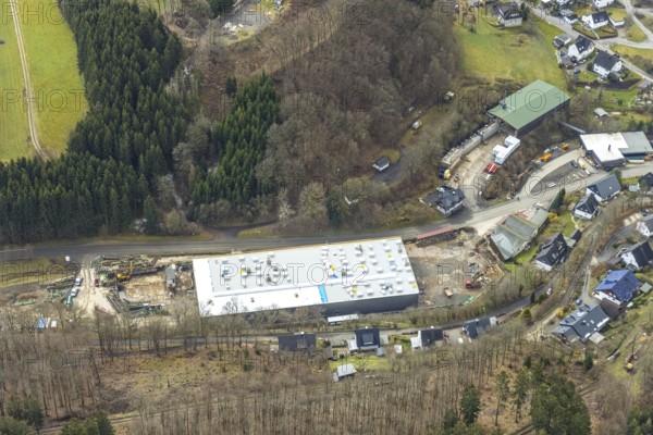Aerial view, new construction of a factory building, sawmill Schrage, Neuenkleusheim, Olpe, Sauerland, district Olpe, North Rhine-Westphalia, Germany, construction area, construction site, building plots, construction project, construction site, DE, Europe, aerial view, aerial photography, aerial photography, new construction, overview, bird's-eye view, overview