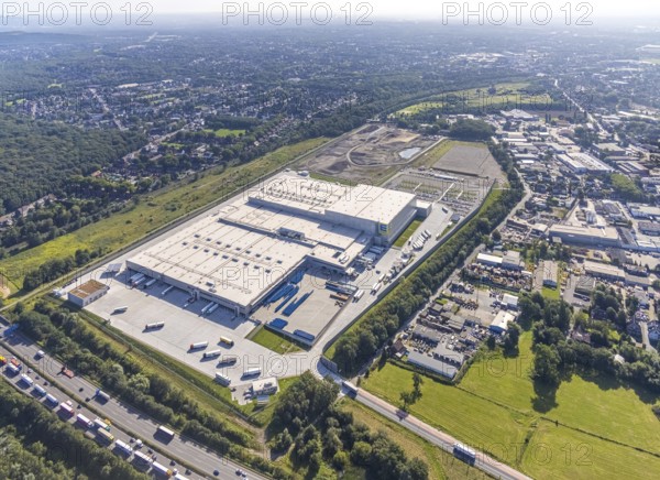 Aerial view, Edeka central warehouse Oberhausen with fallow land and Sterkrade colliery in the district of Schwarze Heide in Oberhausen, Ruhr area, North Rhine-Westphalia, Germany, DE, Europe, commercial enterprises, commercial area, commercial park, commercial location, commercial use, freight transport, industrial area, industrial building, industrial site, logistics, logistics service, logistics service provider, logistics provider, logistics centre, aerial view, aerial photography, aerial photography, Oberhausen, transport service, overview, bird's-eye view, colliery, birds-eyes view, overview