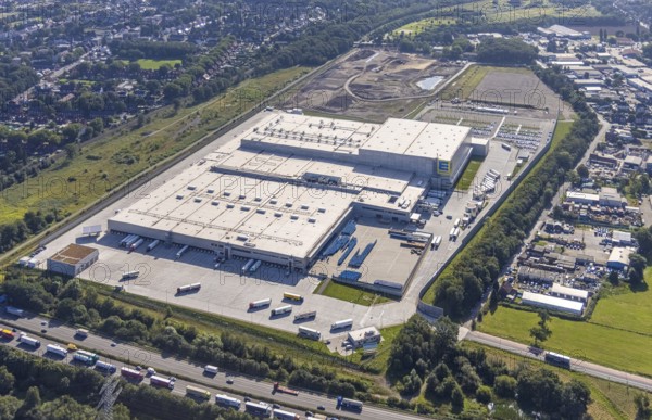 Aerial view, Edeka central warehouse Oberhausen with fallow land in the district Schwarze Heide in Oberhausen, Ruhr area, North Rhine-Westphalia, Germany, DE, Europe, commercial enterprises, commercial area, commercial park, commercial location, commercial use, freight traffic, industrial area, industrial building, industrial location, logistics, logistics service, logistics service provider, logistics provider, logistics centre, aerial view, aerial photography, aerial photography, Oberhausen, transport service, overview, bird's eye view, birds-eyes view, overview