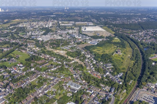Aerial view, Sterkrade colliery with historic winding tower, Edeka central warehouse and SEGRO Logistics Park in the Schwarze Heide district of Oberhausen, Ruhr area, North Rhine-Westphalia, Germany, chemical plant, DE, Europe, commercial enterprises, commercial area, industrial estate, industrial park, industrial estate Waldteich, commercial location, commercial use, freight traffic, industrial area, industrial building, industrial site, logistics, logistics service, logistics service provider, logistics provider, logistics centre, aerial view, aerial photography, aerial photography, Oberhausen, SEGRO Parks, transport service, overview, bird's eye view, colliery, birds-eyes view, overview