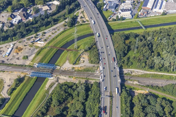 Aerial view, motorway A42 bridge renovation over railway tracks and Emscher as well as new railway bridge construction over the river Emscher in Buschhausen, Oberhausen, Ruhr area, North Rhine-Westphalia, Germany, motorway, construction work, construction area, construction site, construction measure, construction project, construction site, bridge, DE, renovation, Europe, aerial view, aerial photography, aerial photography, renovation, refurbishment, overview, bird's-eye view, overview