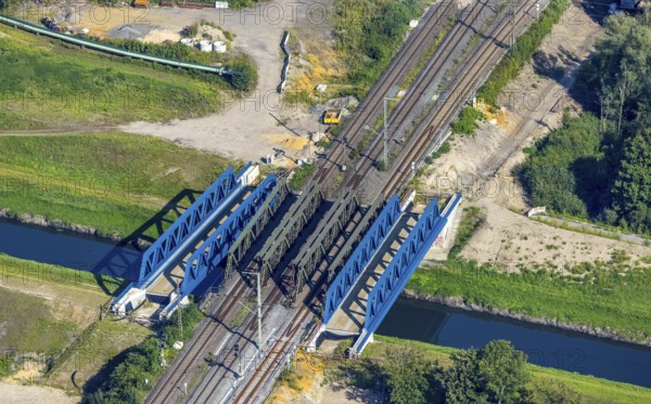 Aerial view, railway bridge construction and renovation over the river Emscher in Buschhausen, Oberhausen, Ruhr area, North Rhine-Westphalia, Germany, construction work, construction area, construction site, construction measure, construction project, construction site, bridge, DE, railway bridge, renewal, Europe, aerial view, aerial photography, aerial photography, new construction, overview, bird's-eye view, overview