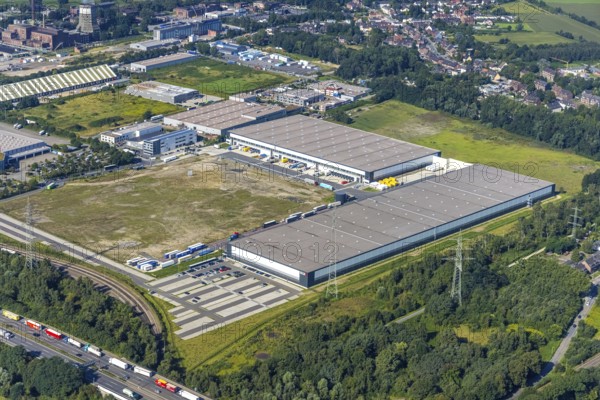 Aerial view, SEGRO Logistics Park Oberhausen and Lekkerland Logistics Centre Oberhausen in the Waldteich Industrial Park in the Holten district of Oberhausen, Ruhr area, North Rhine-Westphalia, Germany, DE, Europe, commercial enterprises, commercial area, industrial estate, Waldteich Industrial Park, commercial location, commercial use, freight traffic, industrial area, industrial building, industrial site, logistics, logistics service, logistics service provider, logistics provider, logistics centre, aerial view, aerial photography, aerial photography, Oberhausen, SEGRO Parks, transport service, overview, bird's-eye view, overview