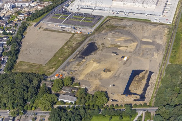 Aerial view, Edeka central warehouse Oberhausen with fallow land in the industrial park Waldteich in the district Schwarze Heide in Oberhausen, Ruhr area, North Rhine-Westphalia, Germany, motorway A3, construction area, building site, building plots, DE, Europe, commercial enterprises, commercial area, industrial park, commercial location, commercial use, freight traffic, industrial area, industrial building, industrial site, logistics, logistics service, logistics service provider, logistics provider, logistics centre, aerial view, aerial photography, aerial photography, Oberhausen, transport service, overview, bird's-eye view, overview