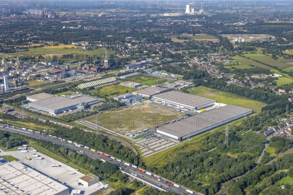 Aerial view, SEGRO Logistics Park Oberhausen and Lekkerland Logistics Centre Oberhausen in the Waldteich Industrial Park in the Holten district of Oberhausen, Ruhr area, North Rhine-Westphalia, Germany, DE, Europe, commercial enterprises, commercial area, industrial estate, Waldteich Industrial Park, commercial location, commercial use, freight traffic, industrial area, industrial building, industrial site, logistics, logistics service, logistics service provider, logistics provider, logistics centre, aerial view, aerial photography, aerial photography, Oberhausen, SEGRO Parks, transport service, overview, bird's-eye view, overview