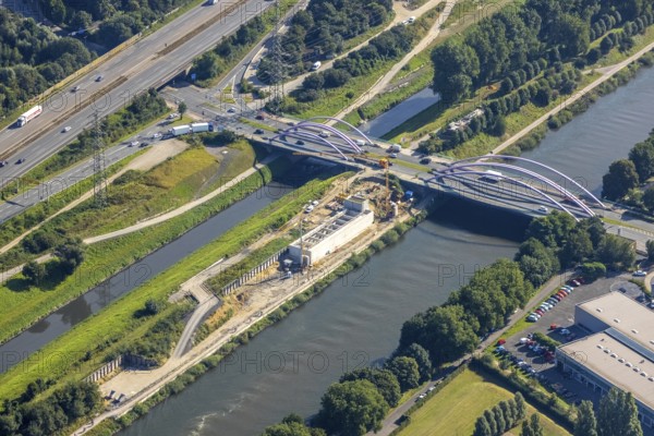 Aerial view, construction site between Rhine-Herne-Canal and river Emscher at the bridge Osterfelder Straße in Vondern, Oberhausen, Ruhr area, North Rhine-Westphalia, Germany, motorway A42, construction work, building, construction area, building site, building plots, construction project, construction site, bridge, DE, Europe, canal, aerial view, aerial photography, aerial photography, new building, overview, bird's-eye view, overview