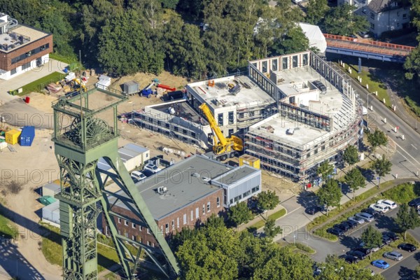 Aerial view, winding tower and Steigerhaus as well as construction site and new building at Vestische Straße corner Zum Steigerhaus at OLGA Park in Osterfeld, Oberhausen, Ruhr area, North Rhine-Westphalia, Germany, construction work, construction area, building site, building plots, construction project, construction site, DE, Europe, aerial view, aerial photography, aerial photography, new building, overview, bird's-eye view, bird's-eye view, overview