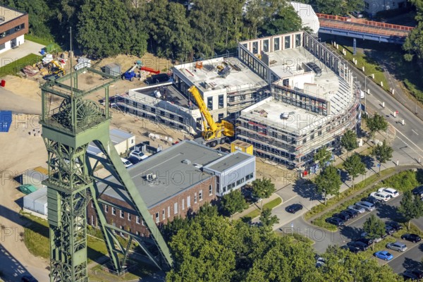 Aerial view, winding tower and Steigerhaus as well as construction site and new building at Vestische Straße corner Zum Steigerhaus at OLGA Park in Osterfeld, Oberhausen, Ruhr area, North Rhine-Westphalia, Germany, construction work, construction area, building site, building plots, construction project, construction site, DE, Europe, aerial view, aerial photography, aerial photography, new building, overview, bird's-eye view, bird's-eye view, overview