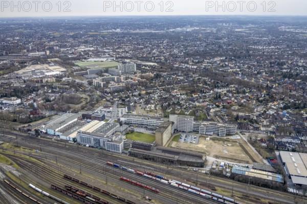 Aerial view, Quartier231 BusinessPark, construction site, Lirich, Oberhausen, Ruhr area, North Rhine-Westphalia, Germany, construction area, building plots, construction project, construction site, DE, Duisburger Straße, Europe, business centre, commercial enterprises, commercial area, commercial park, commercial site, commercial use, aerial view, aerial photography, aerial photography, overview, bird's-eye view, birds-eyes view, former Babcock site, overview