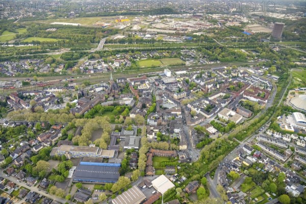 Aerial view, aerial view Osterfeld with Centro Oberhausen and gasometer, Osterfeld, Oberhausen, Ruhr area, North Rhine-Westphalia, Germany, place of worship, education, educational institution, DE, Europe, comprehensive school, comprehensive school Osterfeld, health care, religious community, place of worship, holy place, hospital, heliport, church, parish, clinic, clinic centre, denomination, hospital, teaching institute, aerial view, aerial photography, aerial photography, medical facility, medical aid, religion, religious site, school, St. Marien Hospital, St. Pankratius Church, overview, bird's-eye view, birds-eyes view, overview, medical care