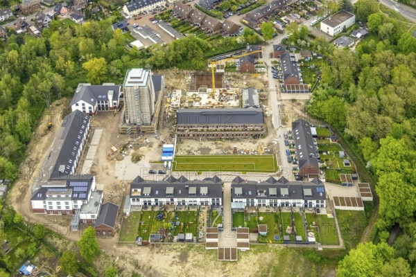 Aerial view, construction site and new construction residential buildings Am Schacht IV, Kursana Domizil Oberhausen, Klosterhardt, Oberhausen, Ruhr area, North Rhine-Westphalia, Germany, retirement home, retirement home, old people's home, construction work, construction area, building site, building plots, construction crane, construction project, construction site, care and nursing, DE, Europe, property tax, real estate, aerial photography, aerial photography, new construction, care facility, retirement home, retirement residence, retirement home, retirement centre, tower, overview, bird's-eye view, residential complex, living and living, residential area, residential buildings, residential quality, residential quarter, housing estate, assisted living, birds-eyes view, overview