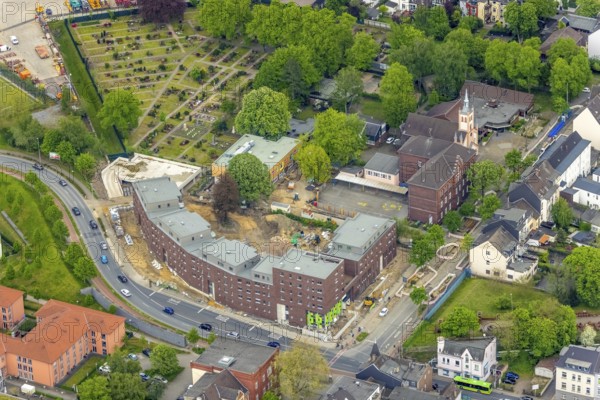 Aerial view, construction site and new building day care centre and flats, Steinbrinkstraße corner Eugen-Zur-Nieden-Ring, Steinbrinkschule, Friedenskirche, Sterkrade Mitte, Oberhausen, Ruhr area, North Rhine-Westphalia, Germany, place of worship, construction work, construction area, building site, building plots, construction measure, construction project, building site, burial site, education, educational institution, DE, Europe, cemetery, memorial, religious community, place of worship, house of God, graves, burial ground, holy place, church, parish, denomination, educational institute, aerial photograph, aerial photography, aerial photography, new building, religion, religious site, resting place, school, overview, bird's-eye view, birds-eyes view, overview