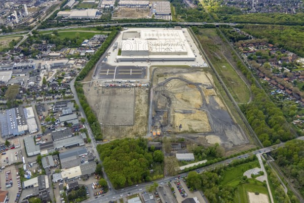 Aerial view, Edeka central warehouse logistics centre, Logport V, LLogport 5, Waldteich, Schwarze Heide, Oberhausen, Ruhr area, North Rhine-Westphalia, Germany, A3 motorway, construction area, building site, building plots, building land, construction project, DE, Edeka Rhein-Ruhr, Europe, commercial enterprises, commercial area, commercial park, commercial location, commercial use, freight traffic, industrial area, industrial location, logistics, logistics service, logistics service provider, logistics provider, logistics centre, aerial view, aerial photography, aerial photography, freight forwarding, transport, transport service, overview, bird's-eye view, Waldteichstraße, birds-eyes view, overview
