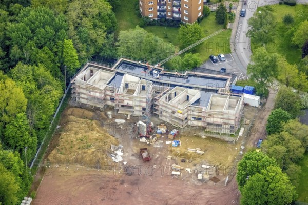 Aerial view, construction site and new building day care centre Drei Knappen on the former sports field Knappenmarkt, Bermensfeld, Oberhausen, Ruhr area, North Rhine-Westphalia, Germany, construction work, construction area, construction site, building plots, construction project, construction site, DE, Europe, high-rise buildings, kindergarten, day nursery, day care centre, day care centre, aerial photograph, aerial photography, aerial photography, new building, overview, bird's eye view, birds-eyes view, overview