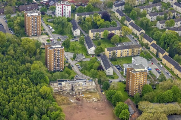 Aerial view, construction site and new building day care centre Drei Knappen on the former sports field Knappenmarkt, high-rise buildings 3 Knappen, Bermensfeld, Oberhausen, Ruhr area, North Rhine-Westphalia, Germany, construction work, construction area, building site, building plots, construction project, construction site, DE, Europe, high-rise buildings, kindergarten, nursery, day care centre, day care centre, aerial photograph, aerial photography, aerial photography, new building, overview, bird's-eye view, overview