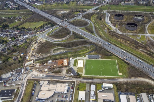 Aerial view, A3 motorway junction Oberhausen-Holten, construction site feeder road, Schwarze Heide, Oberhausen, Ruhr area, North Rhine-Westphalia, Germany, A3 motorway, motorway junction, construction work, construction area, building site, building plots, construction project, construction site, DE, Erlenstraße, Europe, football pitch, aerial view, aerial photography, aerial photography, new construction, sports field, TV Biefang 1912, overview, bird's eye view, birds-eyes view, overview