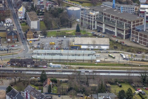 Aerial view, railway station and bus station, biomass cogeneration plant of Energieversorgung Oberhausen AG, Sterkrade Mitte, Oberhausen, Ruhr area, North Rhine-Westphalia, Germany, railway tracks, railway station, bus stop, DE, Deutsche Bahn AG, Europe, main station, power station, aerial view, aerial photography, aerial photography, overview, bird's eye view, ZOB, birds-eyes view, overview