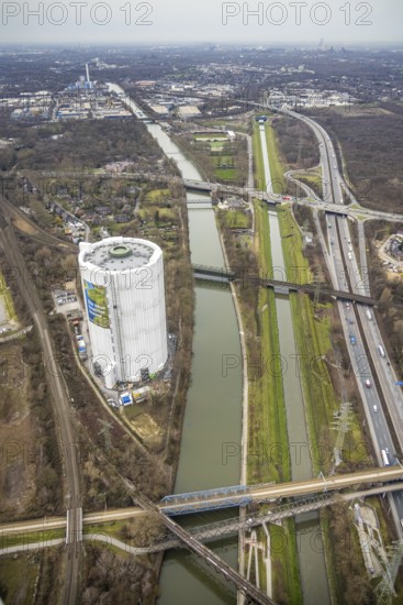 Aerial view, gasometer renovation measures, covered gasometer at CentrO, poster The Emscher is coming, Rhine-Herne Canal. River Emscher, Borbeck, Oberhausen, Ruhr area, North Rhine-Westphalia, Germany, DE, Europe, industrial monument, culture, art, aerial view, aerial photography, aerial photography, overview, events, venue, event location, event centre, bird's eye view, birds-eyes view, cultural use, overview