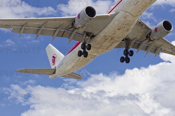 Passenger plane with deployed landing gear, Montreal, Province of Quebec, Canada