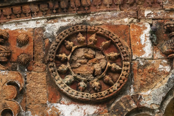 Intricate circular stone design in ancient architecture with detailed carvings-Dhaka, Bangladesh