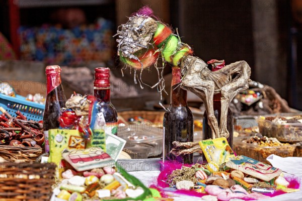 Traditional market stalls with colourful handicrafts and decorative objects, in a lively and psychedelic atmosphere, the witches' market of La Paz in Bolivia