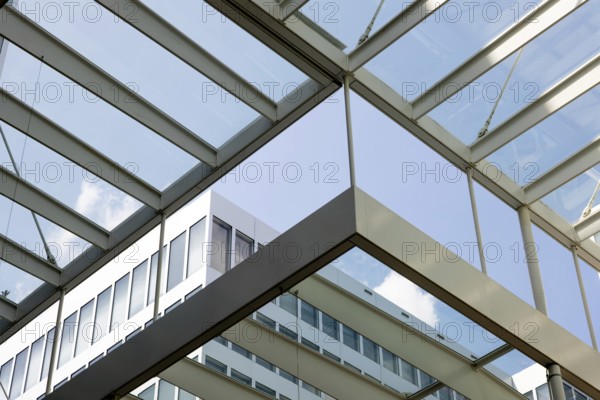 Modern Office Building in Zurich Airport in a Sunny Summer Day with Blue Sky and Clouds in the Airport in Kloten, Zurich, Zurich Canton, Switzerland