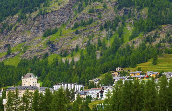 Luxury Hotel in the Forest with Mountain View in the Swiss Alps in a Sunny Summer Day in Pontresina, Maloja, Grisons, Switzerland