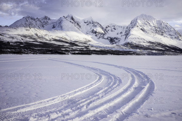Norway tromsö snow mountains lake frozen