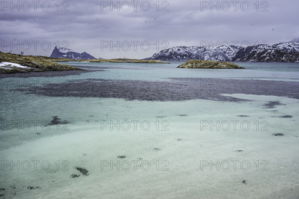 Norway tromsö snow mountains sea turquoise