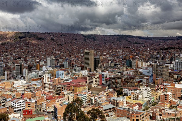 Cityscape with dark clouds in the sky and many buildings, The houses and skyscrapers of the city centre of La Paz in Bolivia