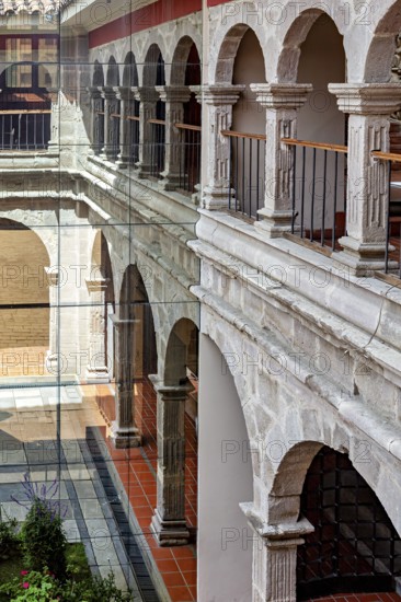 Historic courtyard with classic stone arches and modern glass design, San Fransisco Cathedral in La Paz Bolivia