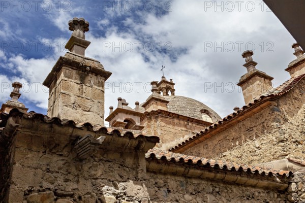View of an old church with stone details and a blossoming sky, San Fransisco Cathedral in La Paz Bolivia