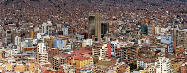 Dense urban development of La Paz with many buildings under a clear sky, The houses and skyscrapers of the city centre of La Paz in Bolivia