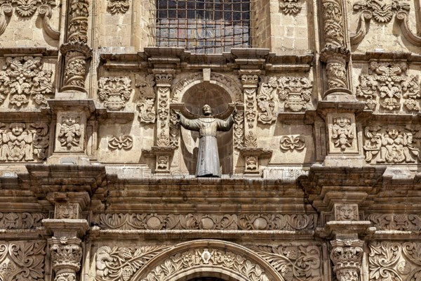 Detailed façade with religious sculpture and elaborate baroque style, San Fransisco Cathedral in La Paz Bolivia