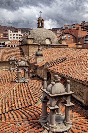 View of the interlocking roofs of a church with the surrounding town, San Fransisco Cathedral in La Paz Bolivia