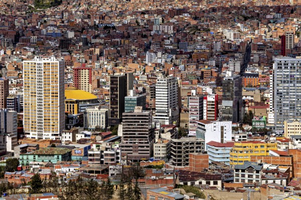 Aerial view of a city with many high-rise buildings and dense development, The houses and skyscrapers of the city centre of La Paz in Bolivia