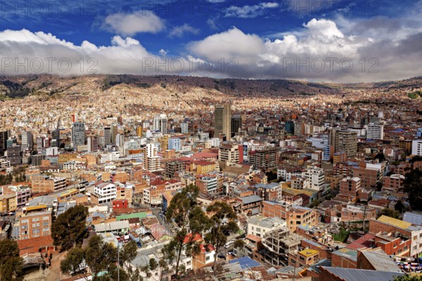 City view of La Paz with densely built structures and cloudy sky, The houses and skyscrapers of the city centre of La Paz in Bolivia