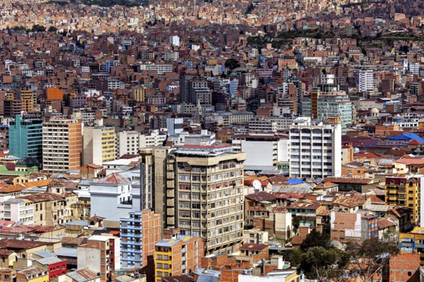 View of a city with many buildings in densely populated surroundings, The houses and skyscrapers of the city centre of La Paz in Bolivia