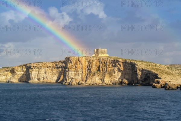 Amazing view of rainbow after the rain above Comino island, Malta