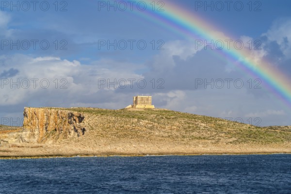 Amazing view of rainbow after the rain above Comino island, Malta