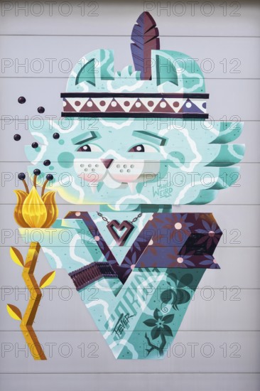 Illustration of a stylised cat decorated with a headdress and feather, at the port of Linz, Upper Austria Austria